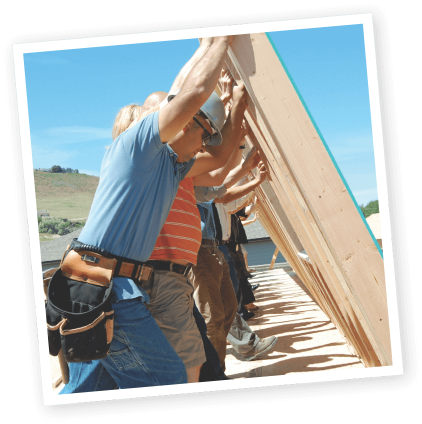 image of volunteers helping build a home